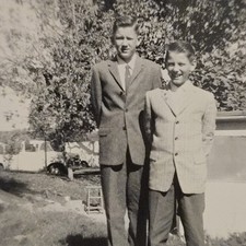 Vintage B&W Photograph of 2 Young Boys in Suits Standing Outside Together picture