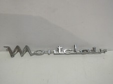 Vintage Mercury Montclair 1950's Emblem Badge Script Name Metal  picture
