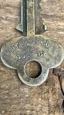 RARE City Gun Store Duluth MN Advertising Key Antique Sporting Goods Relic picture