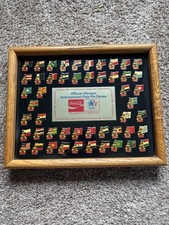 Coca-Cola 1984 Olympic International Flag Pin Series In Oak Frame (50 Pins) picture