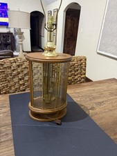 This item is a vintage Don Ward etched amber glass panel table lamp, typically picture