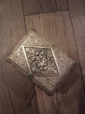 Antique ornate silver plated 1920's in good condition cigarette/trinket box. picture