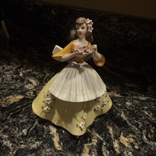 Vintage 1950's Lady Figurine Brunette Yellow White Pleated Apron Pink Flowers 6” picture
