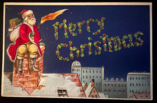 SILK~Santa Claus on Snowy Roof Over City with Torch~1910 Christmas Postcard~s262 picture