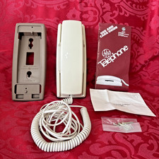 VINTAGE NEW IN BOX GE PUSHBUTTON ROTARY DIALING PHONE, BEIGE BODY W/ TAN BASE picture