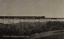 Steam Train on Lyon Brook Bridge Norwich New York Chenango County NY Postcard picture