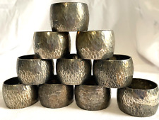 10 VINTAGE HAMMERED SILVER PLATED NAPKIN RINGS  -  picture