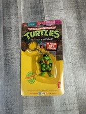 Vintage 1980s Teenage Mutant Ninja Turtles Donatello Key Chain SEALED NIB picture