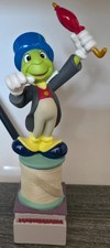Disney Pinocchio Jiminy Cricket Figurine on Top of a Spool of Thread & Matchbox picture