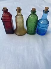 Wheaton's 4 Colored Glass Bitters Bottles Green, Red, Blue and Amber picture