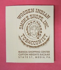 WOODEN INDIAN SMOKE SHOPS TOBACCONIST ADVERTISING MATCHBOX SLIP COVER-MEDIA PA picture