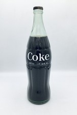 💥 1965 Coca-Cola Green Glass Hobbleskirt Bottle-1 PT 10 OZ-Denver- Unopened picture
