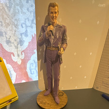 collectible figurine of country music legend Porter Wagoner. picture
