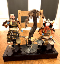 ANTIQUE JAPANESE SAMURAI DOLLS WITH STAND. picture