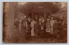 Vintage RPPC Group Portrait Women Children Rustic Building Cello-tix Postcard picture
