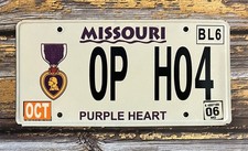 2006 Missouri PURPLE HEART License Plate 0P H04 picture