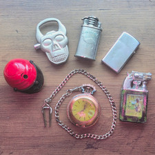 Lot of Mixed Collectible Novelty Lighters— Camel, Skull, Helmet, pocket watch, picture