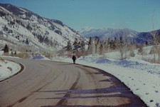 c1960's Kodachrome 35mm Slide Lone Person Walking Snowy Mountain Road Aspen picture