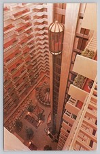 Vintage Regency Hyatt House Atlanta GA Hotel Atrium Glass Elevators Postcard picture