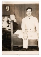 Edwardian Era Young Man Sitting on a Bed Bedroom Real Photo Postcard RPPC Posted picture
