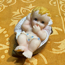 Ceramic Baby Figurine in Shell Basket Glossy Multicolor Small Kids Decor picture
