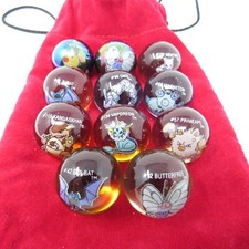 Pokemon Marble Lot of 11: 1 Rhydon #112 Pouch 11 Marbles Total 9 Clear 2 Holo picture