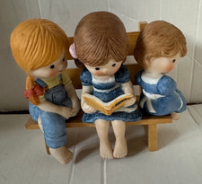 Enesco Country Cousins Sitting on Wood Bench Reading a Book EUC picture