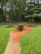 vintage 1920s-era brass winged radiator cap and hood ornament, With A P Or F picture