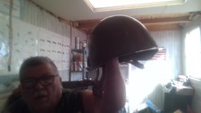 two military helmets and one patriatic box picture
