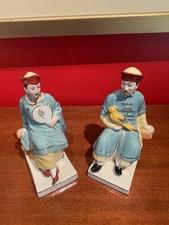 Two Porcelain Figures In Traditional Chinese Clothing picture