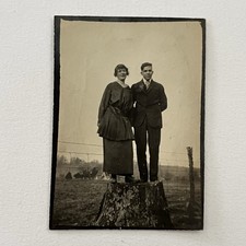 Antique Sepia Snapshot Photograph Young Couple Standing On Tree Stump On Farm picture