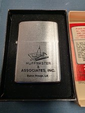 Vintage 1979 Zippo Lighter NOS NIB Unused Error Stamp Huffmaster Baton Rouge LA picture