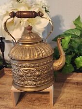 Antique Brass Tea Kettle with Wood Handle and Intricate Design picture