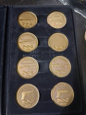 NRA Classic Collector’s Series Medallions –20th Century Military Weapons. 8 Pcs. picture