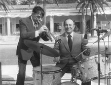 Musician Tino Rossi plays the drums, accompanied by Aime Barell- 1955 Old Photo picture