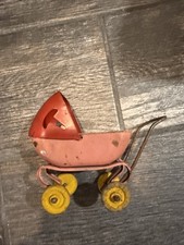 VINTAGE Wyandotte Pressed Steel Baby Buggy Carriage Red And Pink; Used picture