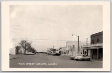 c1950s RPPC Main Street Satanta Kansas Old Cars Drug Store Unposted picture