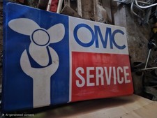 Vintage OMC Service Sign part of a lighted sign display. picture