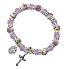 7.5in Violet Rhinestone and Ceramic Stretch Bracelet Comes Carded picture