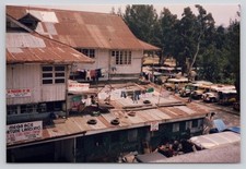 Vintage Photo Baguio Philippines Street Scene and Home Clothes and Tires on Roof picture