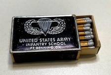 Vintage US Army Infantry School Ft Benning GA Airborne Wings Metal Matchbox picture