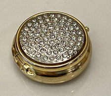 VTG CARANCI ITALIAN PILL BOX RHINESTONE CRYSTALS TOP EMBOSSED BOTTOM LUCITE picture