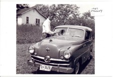 Man Washing 1951 Crosley Automobile Photo picture