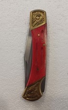 Frost Cutlery Lockback Clip Point Knife with a red jigged bone handle picture