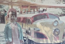 Vintage Photo Snapshot of Young Girl Smiling by Small Kansas City Southern Train picture