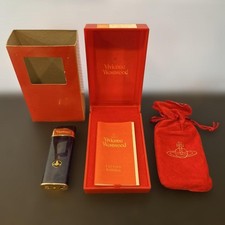 Vintage Vivienne Westwood Oil Lighter Used with box and bag picture