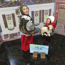 2 Byers Choice Young  Lady with House and Boy  $66 (Lot 135)  from 1999 & 2014 picture
