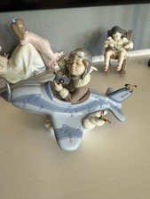 Lladro Porcelain Figurine #5697 Pilot Boy with Airplane and Birds picture
