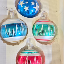 These are 4 mid-century baubles. picture