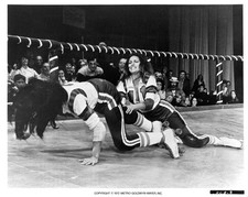 Helena Kallianiotes is grabbed by Raquel Welch in a scene from the- Old Photo picture